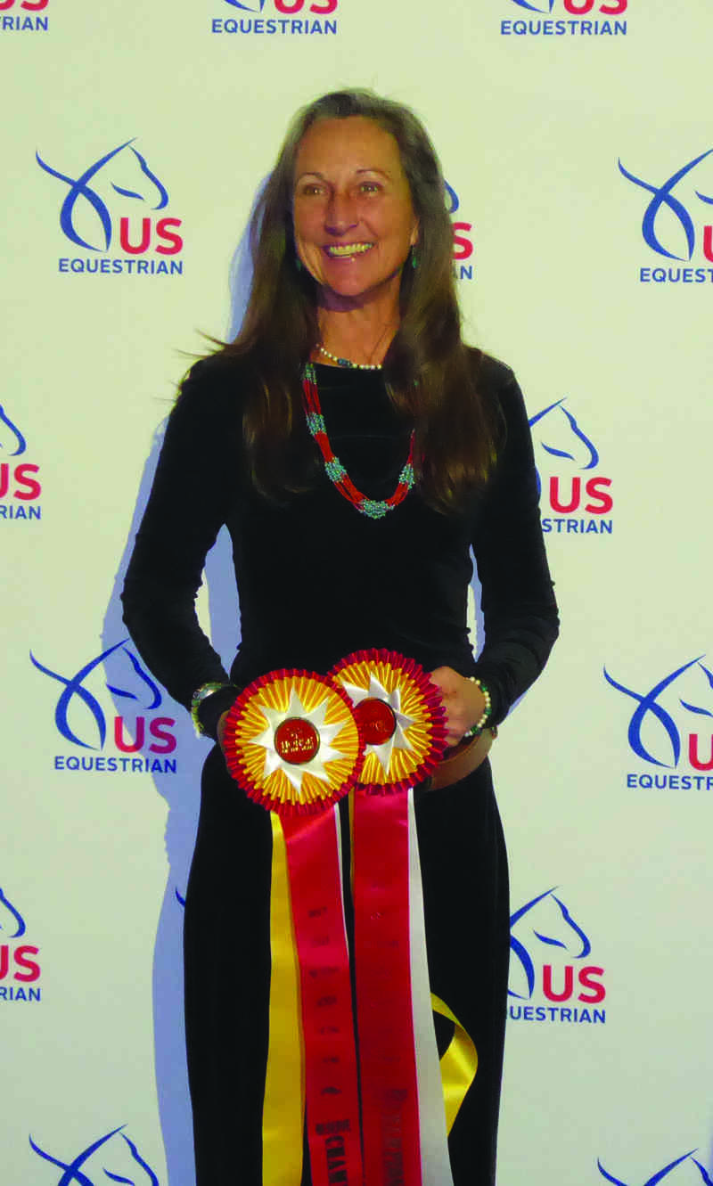 Cathy Blackmon, recipient of 2023 Crestwood Award, holding ribbons